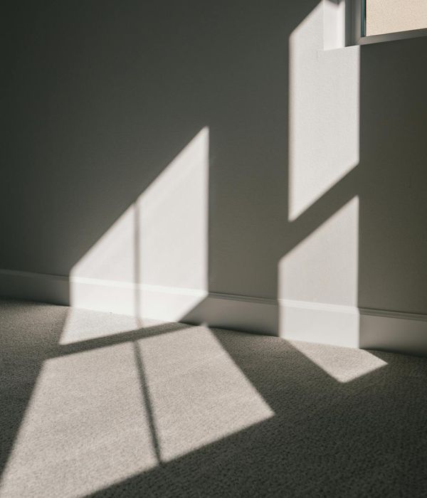 A calm and spacious room for practice with soft natural light.